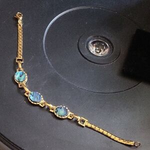 Elegant Gold and Blue Bracelet